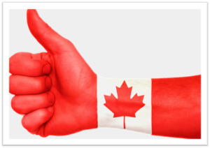 Canadian flag painted on an arm and hand giving as thumbs up. 